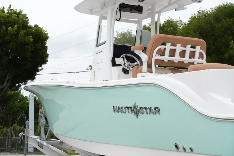 Slide: The Image of 2025 NauticStar 252 Legacy boat with sleek design and modern features. - 4