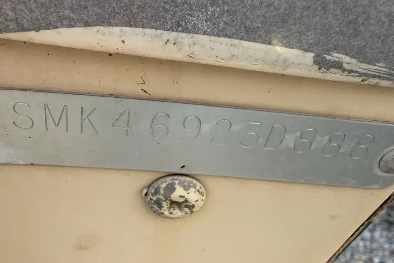 Slide: The Image of Hull identification number on 1988 Smoker Craft Magnum 162 boat. - 8
