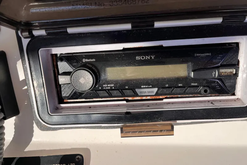 Slide: The Image of Sony stereo system on a 2001 Silverton 42C boat dashboard. - 17