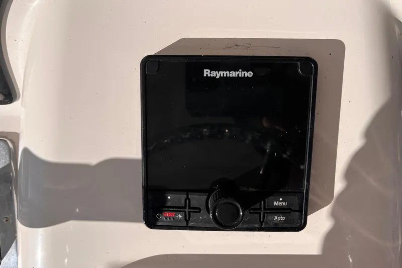 Slide: The Image of Raymarine control panel on 2001 Silverton 42C boat dashboard. - 20