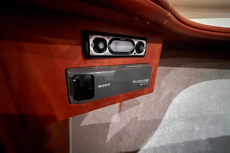 Slide: The Image of Sony audio system in 2001 Silverton 42C boat interior, featuring wood paneling. - 73