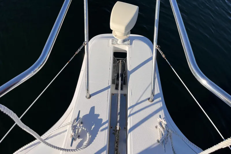 Slide: The Image of Bow of a 2001 Silverton 42C yacht with anchor and railing. - 90