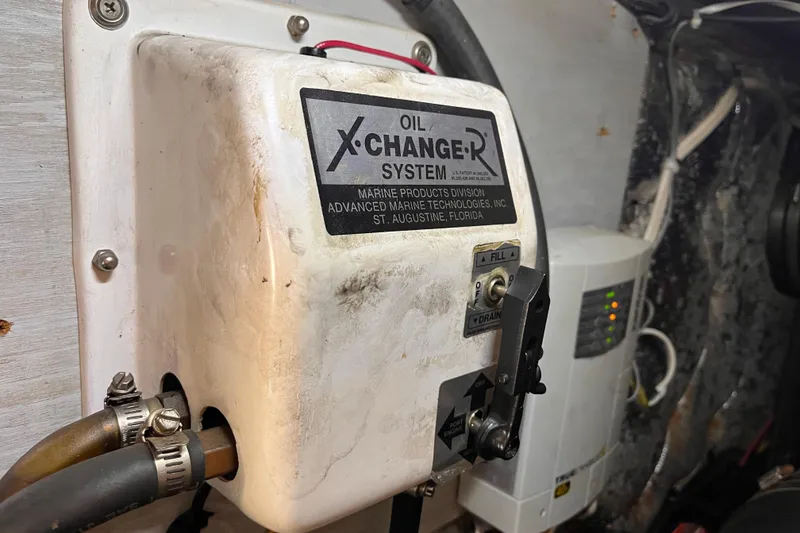 Slide: The Image of Oil X-Change-R system in 2001 Silverton 42C engine room. - 96