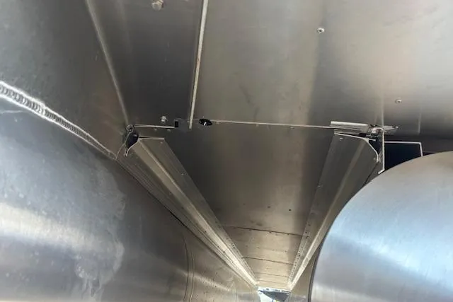 Slide: The Image of Underneath view of 2026 Tahoe Pontoon LTZ 2385 EL Tritoon, showcasing aluminum construction. - 11