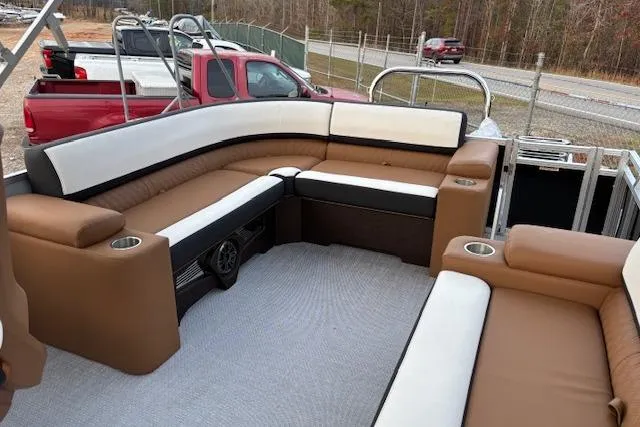 Slide: The Image of 2026 Tahoe Pontoon LTZ 2385 EL Tritoon with spacious seating and cup holders. - 14