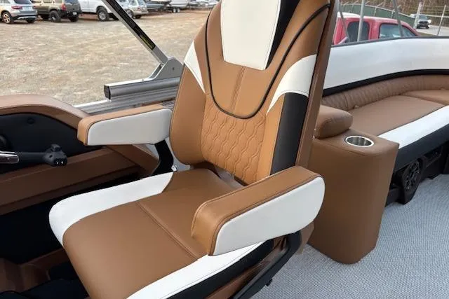 Slide: The Image of Luxurious seating in 2026 Tahoe Pontoon LTZ 2385 EL Tritoon boat interior. - 16