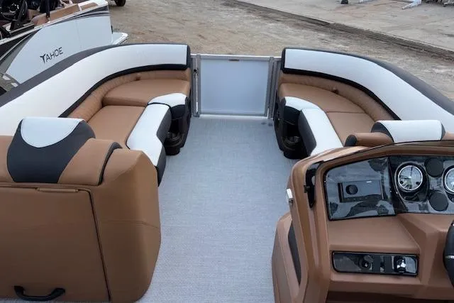 Slide: The Image of 2026 Tahoe Pontoon LTZ 2385 EL Tritoon with luxurious seating and modern dashboard. - 20