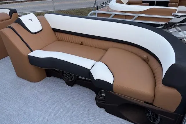 Slide: The Image of 2026 Tahoe Pontoon LTZ 2385 EL Tritoon with luxurious tan and white seating. - 22
