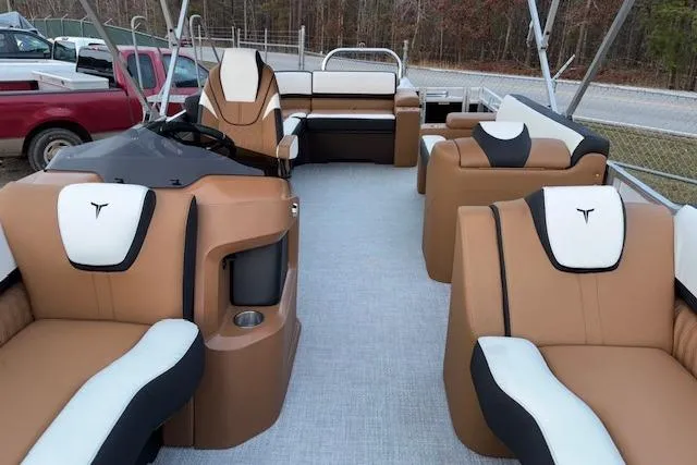 Slide: The Image of 2026 Tahoe Pontoon LTZ 2385 EL Tritoon with luxurious seating and modern design. - 23