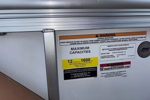 Slide: The Image of 2026 Tahoe Pontoon LTZ 2385 EL Tritoon capacity warning label, 12 persons or 1600 lbs. - 28