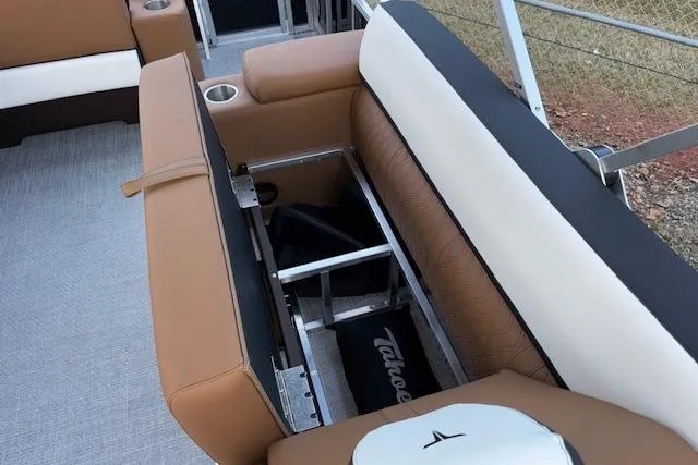 Slide: The Image of 2026 Tahoe Pontoon LTZ 2385 EL Tritoon interior seating with storage compartment. - 30