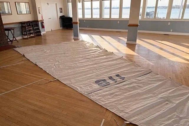 Slide: The Image of Sail laid out in a sunlit room, Bristol 29.9, 1978 model. - 10