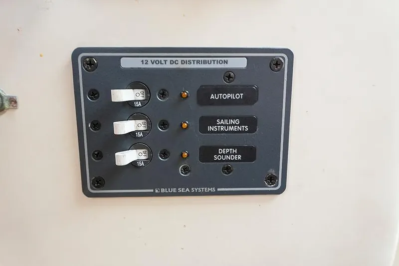 Slide: The Image of 12V DC distribution panel on 1978 Bristol 29.9, featuring autopilot and sailing instruments. - 37