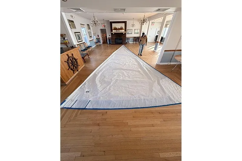 Slide: The Image of Large sail laid out indoors, Bristol 29.9 model, 1978, with nautical decor. - 6