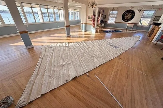 Slide: The Image of Sail from a 1978 Bristol 29.9 yacht laid out in a sunlit room. - 9