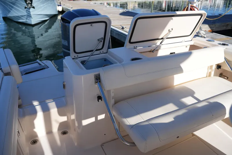 Slide: The Image of 2018 Grady-White Fisherman 236 boat interior with open storage compartments and seating. - 25