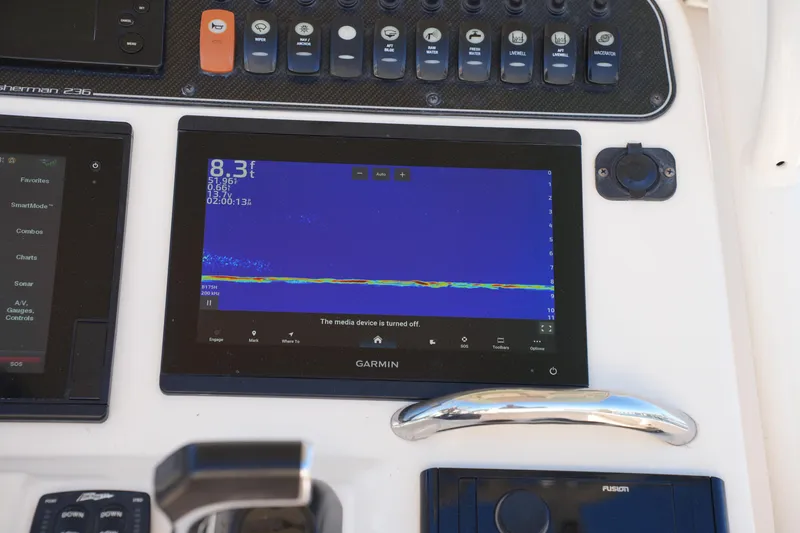 Slide: The Image of Garmin marine display on 2018 Grady-White Fisherman 236 boat dashboard. - 30