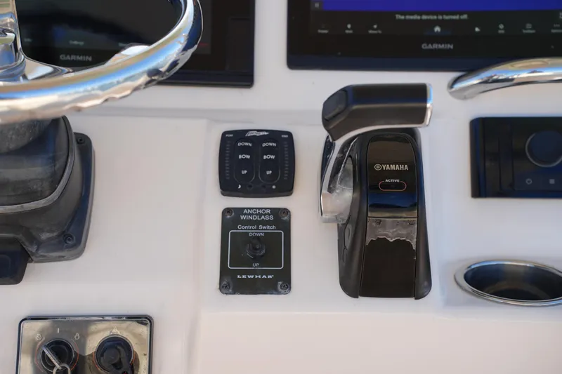 Slide: The Image of Control panel of 2018 Grady-White Fisherman 236 with Yamaha throttle and Garmin display. - 32