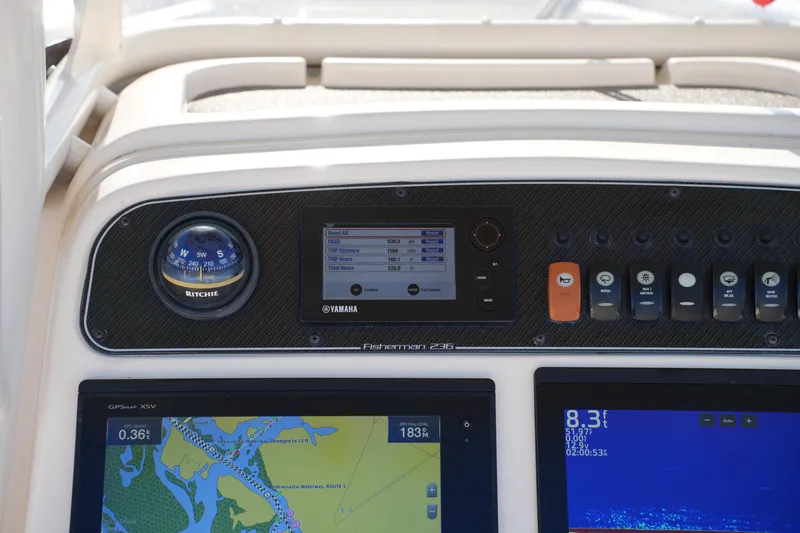 Slide: The Image of Dashboard of 2018 Grady-White Fisherman 236 boat with navigation and control systems. - 34