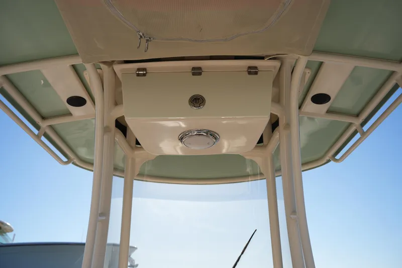Slide: The Image of 2018 Grady-White Fisherman 236 boat console with overhead storage and speakers. - 36