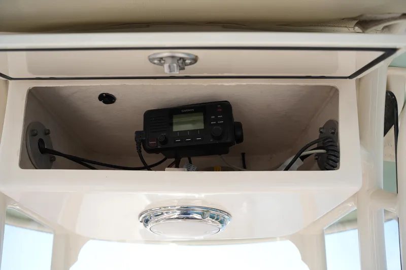 Slide: The Image of 2018 Grady-White Fisherman 236 boat console with Garmin radio equipment. - 37