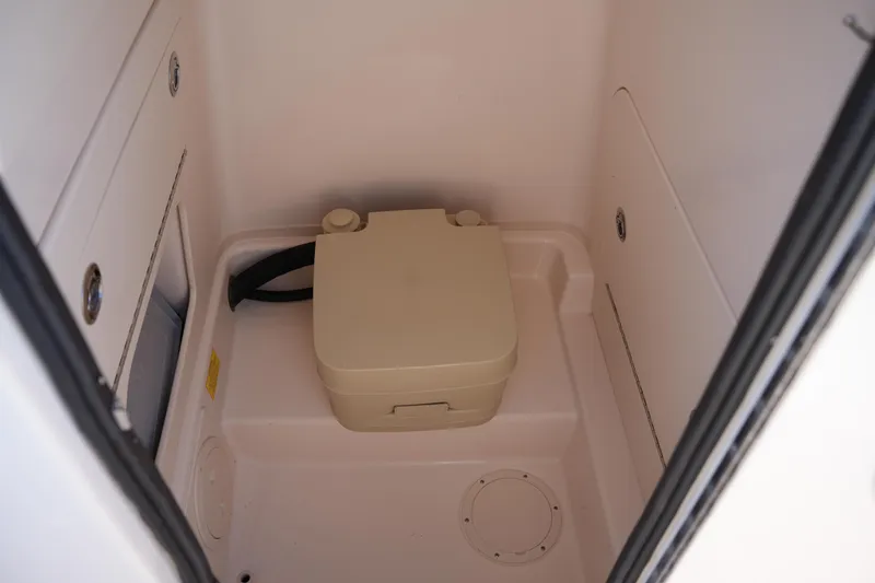 Slide: The Image of 2018 Grady-White Fisherman 236 boat interior with portable toilet. - 38