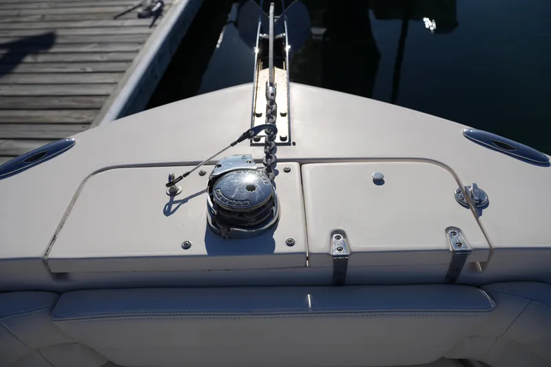 Slide: The Image of Bow of 2018 Grady-White Fisherman 236 with anchor winch at dock. - 44