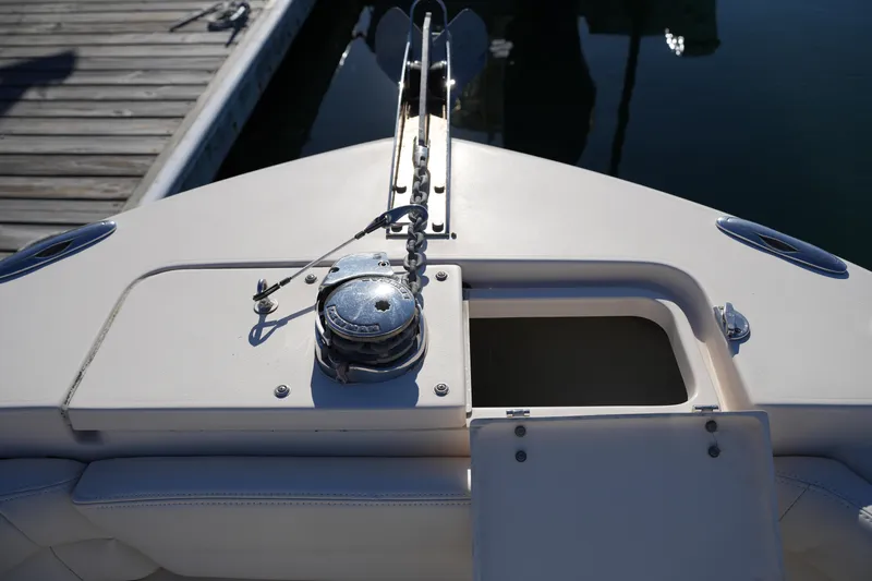 Slide: The Image of Bow area of 2018 Grady-White Fisherman 236 with anchor system and storage compartment. - 45
