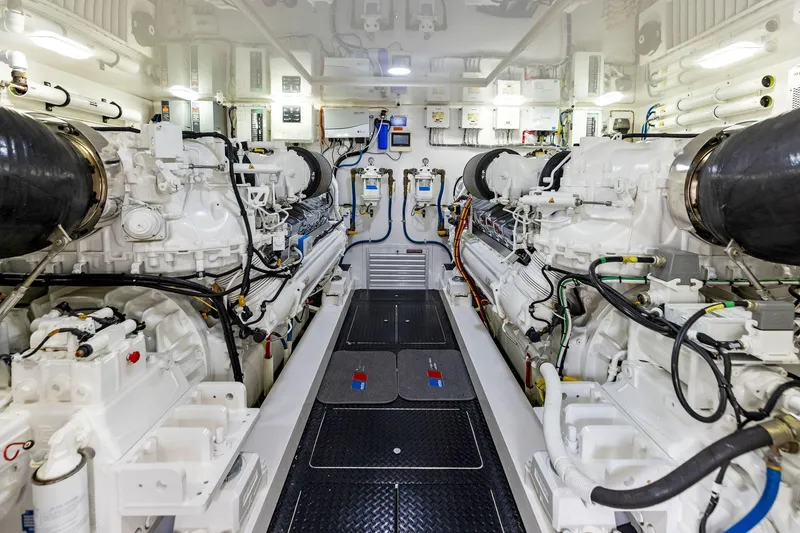 Slide: The Image of Engine room of 2018 Viking 80 Convertible yacht, showcasing advanced machinery and systems. - 25