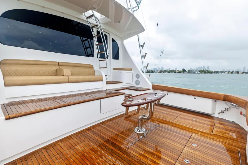 Slide: The Image of Luxurious 2018 Viking 80 Convertible yacht with elegant teak deck and comfortable seating. - 7