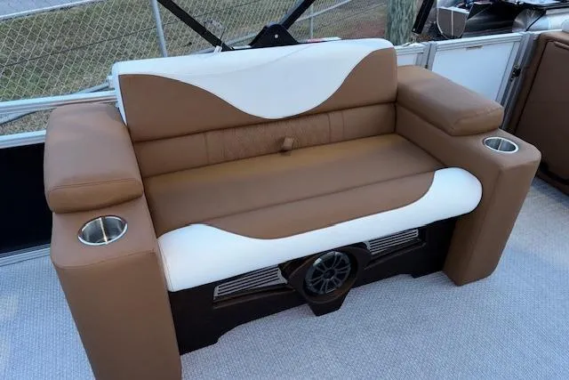 Slide: The Image of Luxurious seating on 2026 Tahoe Pontoon LTZ 2185 ELITE with cup holders and speaker. - 13