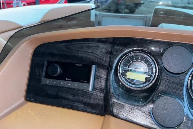Slide: The Image of Dashboard of 2026 Tahoe Pontoon LTZ 2185 ELITE with audio system and gauges. - 18