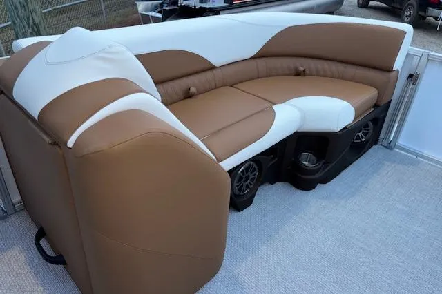 Slide: The Image of 2026 Tahoe Pontoon LTZ 2185 ELITE interior with brown and white seating. - 22