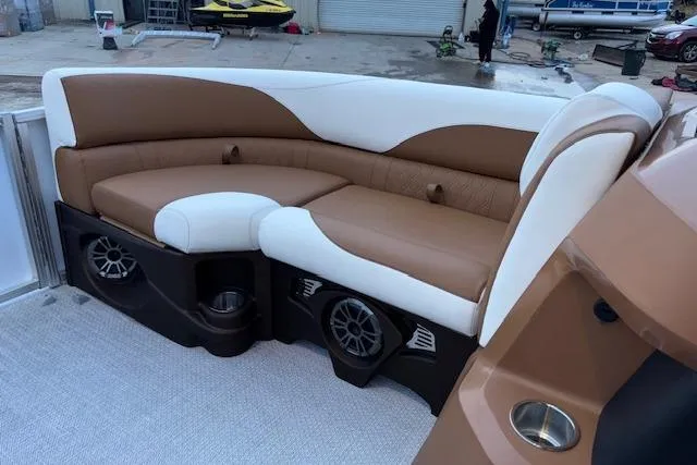 Slide: The Image of Luxurious seating on 2026 Tahoe Pontoon LTZ 2185 ELITE with integrated speakers. - 23