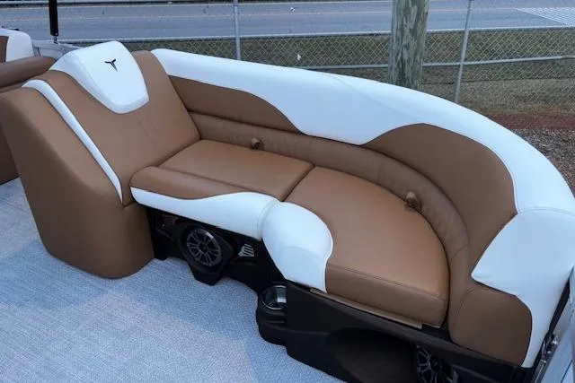 Slide: The Image of 2026 Tahoe Pontoon LTZ 2185 ELITE with luxurious tan and white seating. - 24