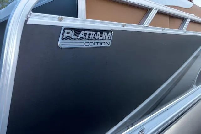 Slide: The Image of 2026 Tahoe Pontoon LTZ 2185 ELITE Platinum Edition, sleek design with metallic accents. - 7
