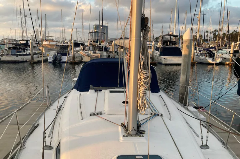 Slide: The Image of Beneteau Oceanis 361 sailboat docked in a marina, 2000 model year. - 5