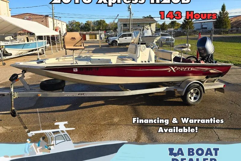 The Image of 2013 Xpress H20B Bay boat on trailer, 143 hours, financing and warranties available. - 0