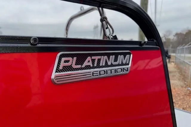 Slide: The Image of Red Tahoe Pontoon LTZ 2385 VRB Tritoon, Platinum Edition badge, 2026 model. - 11