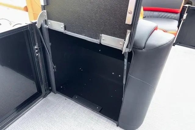 Slide: The Image of Open storage compartment on 2026 Tahoe Pontoon LTZ 2385 VRB Tritoon boat. - 29