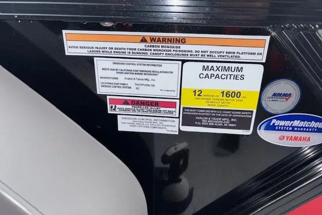 Slide: The Image of Warning labels and capacity information on a 2026 Tahoe Pontoon LTZ 2385 VRB Tritoon. - 33