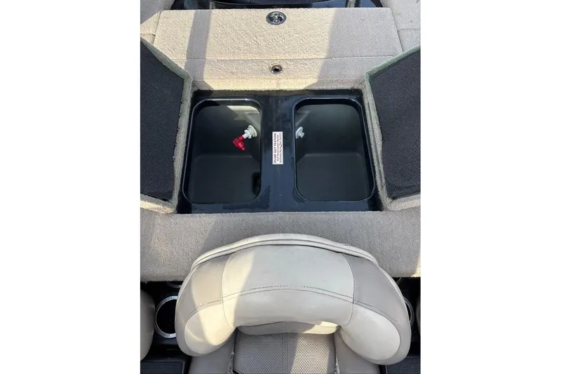 Slide: The Image of Interior of a 2013 Nitro Z-7 boat with storage compartments. - 5