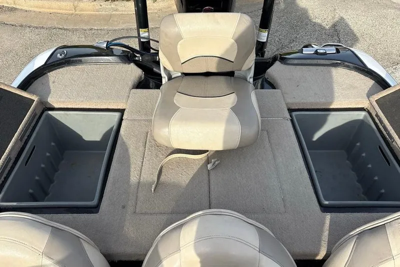 Slide: The Image of Interior of a 2013 Nitro Z-7 boat with seats and storage compartments. - 6
