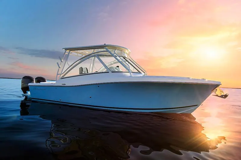 Slide: The Image of Manufacturer Provided Image: 2025 Albemarle 27 Dual Console boat at sunset on calm water. - 3