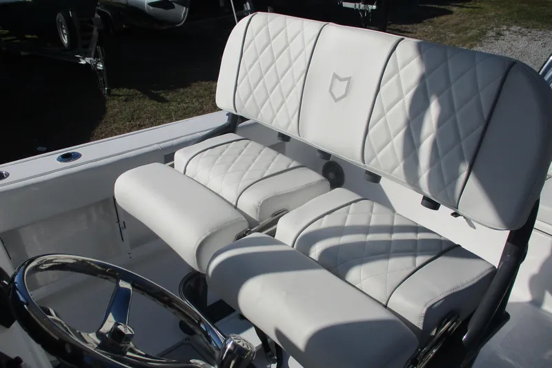 Slide: The Image of 2026 Sea Fox 248 Commander boat with luxurious white quilted seating. - 12