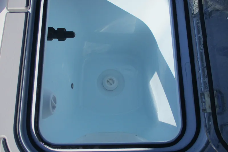 Slide: The Image of Livewell compartment of 2026 Sea Fox 248 Commander boat, featuring a clean interior. - 15