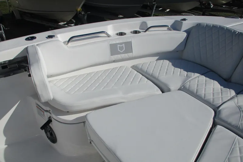 Slide: The Image of 2026 Sea Fox 248 Commander boat with luxurious white seating and cup holders. - 6