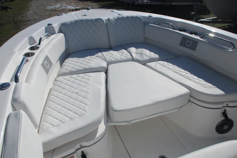Slide: The Image of 2026 Sea Fox 248 Commander boat with luxurious white seating and cup holders. - 7
