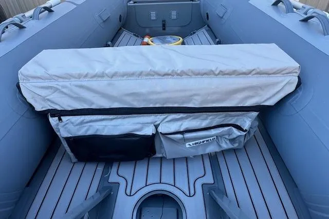 Slide: The Image of 2025 Highfield Classic 340 inflatable boat interior with storage compartments. - 8