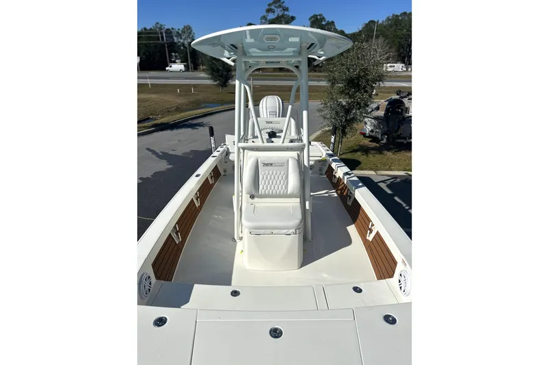 Slide: The Image of 2026 Pathfinder 2500 Hybrid boat with sleek design and spacious deck. - 2